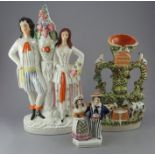 A group of nineteenth century Staffordshire figures, c.1860-70. To include a large figure