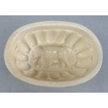 An early nineteenth century creamware jelly mould, c. 1830. It depicts an elephant. 8 cm wide. (1)