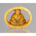 A Japanese ivory netsuke of a woman seated within a barrel, Meiji period, 1868-1912, signed, width