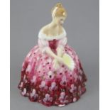 A Royal Doulton figure titled 'Victoria', HN 2472 with hand-painted floral dress. 18 cm tall.