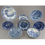 A group of early nineteenth century blue and white transfer-printed saucers, c.1820-30. To