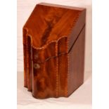 A George III mahogany knifebox with a serpentine front, crossbanding with satinwood stringing,