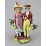A nineteenth century William Kent Staffordshire figure of the Dandies, c.1880-1900. They are both