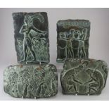 A group of four twentieth century terracotta wall plaques in the Greek-style, each depicting Grecian