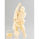 A Japanese Meiji ivory of a peasant.