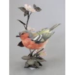 A Royal Worcester ceramic bird study incorporating metal. Modelled as a Chaffinch. Factory mark to