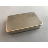 A continental silver snuff box with engraved frieze and initials