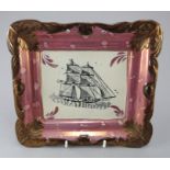 An early nineteenth century Sunderland lustre transfer-printed plaque, c.1830-40. It is decorated