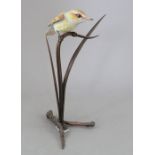 An Albany Fine China Co. ceramic bird study incorporating metal. Modelled as a Warbler. Factory mark