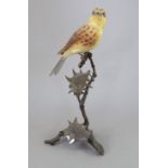An Albany Fine China Co. ceramic bird study incorporating metal. Modelled as a Yellow Bunting.