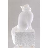 A Lalique frosted glass paperweight of a cat gazing upwards, signed Lalique R. France, height 15cm