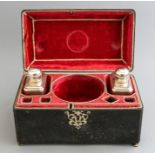 A George II shagreen tea caddy, circa 1750, of sarcophagus form, nickel mounts, swing handle,