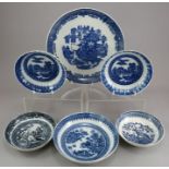 A group of early nineteenth century blue and white transfer-printed chinoiserie saucers, c.1800-