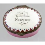 A Bilston enamel oval patch box, circa 1790, the cover with motto A Trifle from Norwich, width 4cm