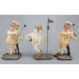 A group of three Albany Fine China Wind in the Willows golfing figures on metal bases. To include: