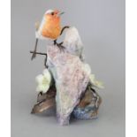 An Albany Fine China Co. ceramic bird study incorporating metal. Modelled as a Robin, Christmas