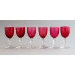 A set of six 19th Century ruby glass wines, baluster facet cut stems, ground pontls, height 13cm (6)