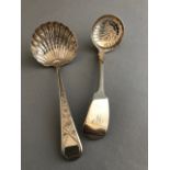 A William IV silver casting ladle, fiddle pattern, London 1837, and a George III sifting ladle,