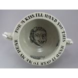 A nineteenth century black and white transfer-printed chamber pot, c.1840-50. It is decorated with