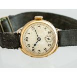 A 1930's ladies 9c gold wristwatch, 2cm circular champagne dial with Arabic numerals, rayon strap