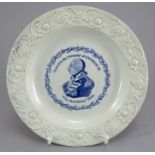 An early nineteenth century commemorative blue and white transfer-printed moulded child's plate, c.