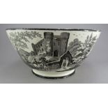 An early nineteenth century black and white transfer-printed large creamware bowl, c.1820. It was