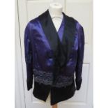 An Italian design garment, a purple satin jacket, 1890-1900, loose fitting, the back is heavily