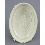 A fine late eighteenth century creamware jelly mould, c. 1790. It depicts a flag iris. 13 cm