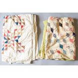 A double bed cover with a wide cotton edge, the middle has a large square patchwork middle,