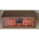 A late 17th Century oak table top bible box, ring hinges, lunette carved frieze with polychrome