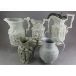 A group of early nineteenth century stoneware relief moulded jugs, c.1830-50. To include: a Minton