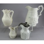A group of early nineteenth century white stoneware relief moulded jugs, c.1830-50. To include: a