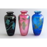 A series of three Okra glass baluster vases, one ruby iridescent, signed and dated 1991, one blue