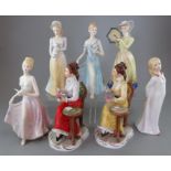 A group of Francesca Fine Bone China female figures. Factory mark to base. 22 cm tall. (7)