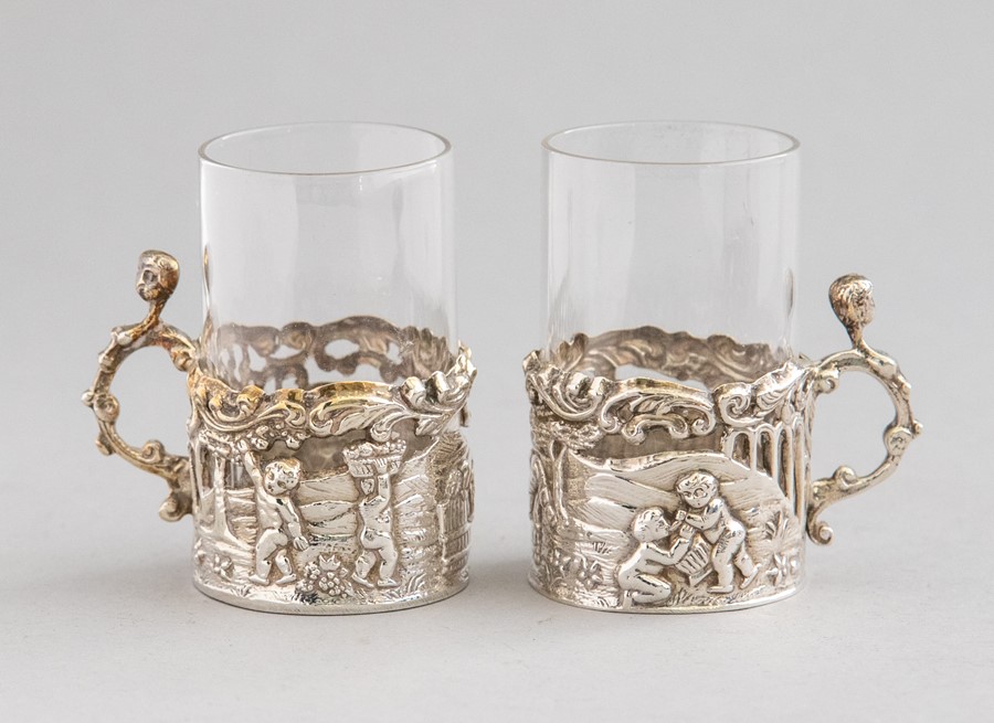 A cased set of six late Victorian silver miniature demitasse, pierced cherub scenes, clear glass - Image 2 of 3