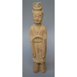 An old Chinese straw glazed pottery tomb type  figure of a courtier with hands tucked into