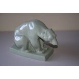 John Skeaping for Wedgwood, a celadon green glazed model of a polar bear, seated on a rectangular