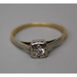 A single stone diamond ring, the old brilliant cut diamond, in carved illusion mount, tapering