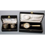 Hamiltons Calcutta, a presentation cased white metal tea strainer with turned ivory handle, together