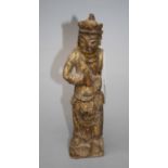 A  Chinese possibly Ming dynasty carved and gilded figure of Guanyin with hands joined in the Anjali