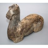 An old Chinese, pottery tomb figure of a horse with torso and head bearing signs of poly-chromatic