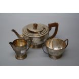 Deakin and Francis, a silver three piece tea service, each with Art Deco style handle. Birmingham