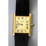 A gentleman's silver gilt Tank quartz Must de Cartier wristwatch, the rectangular cream coloured