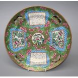 A Chinese 19th century famille rose,porcelain desert plate painted with fungus, insects and panels