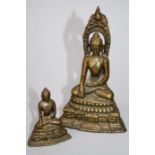 An Indian bronze Bodhisattva, seated cross legged upon a lotus socle, 13.5cm together with