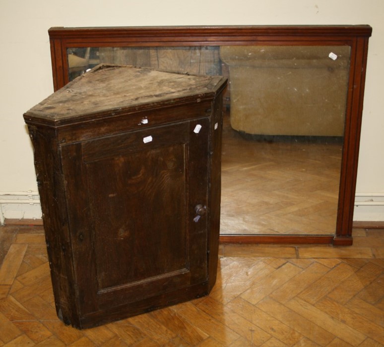 A small 19th century elm single door hanging corner cupboard, together with a mahogany framed rectan