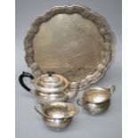 An early to mid 20th century Indian silver four piece tea service. The pie crust tray with
