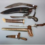 1939 -45 Gurkha Kukri and scabbard with accompanying karda and chalmak  A Sumatran kriss and