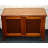 A 19th century oak coffer of small proportions with candle box interior together with an early