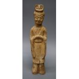 An old Chinese straw glazed pottery tomb type figure of a courtier with hands tucked in sleeves.